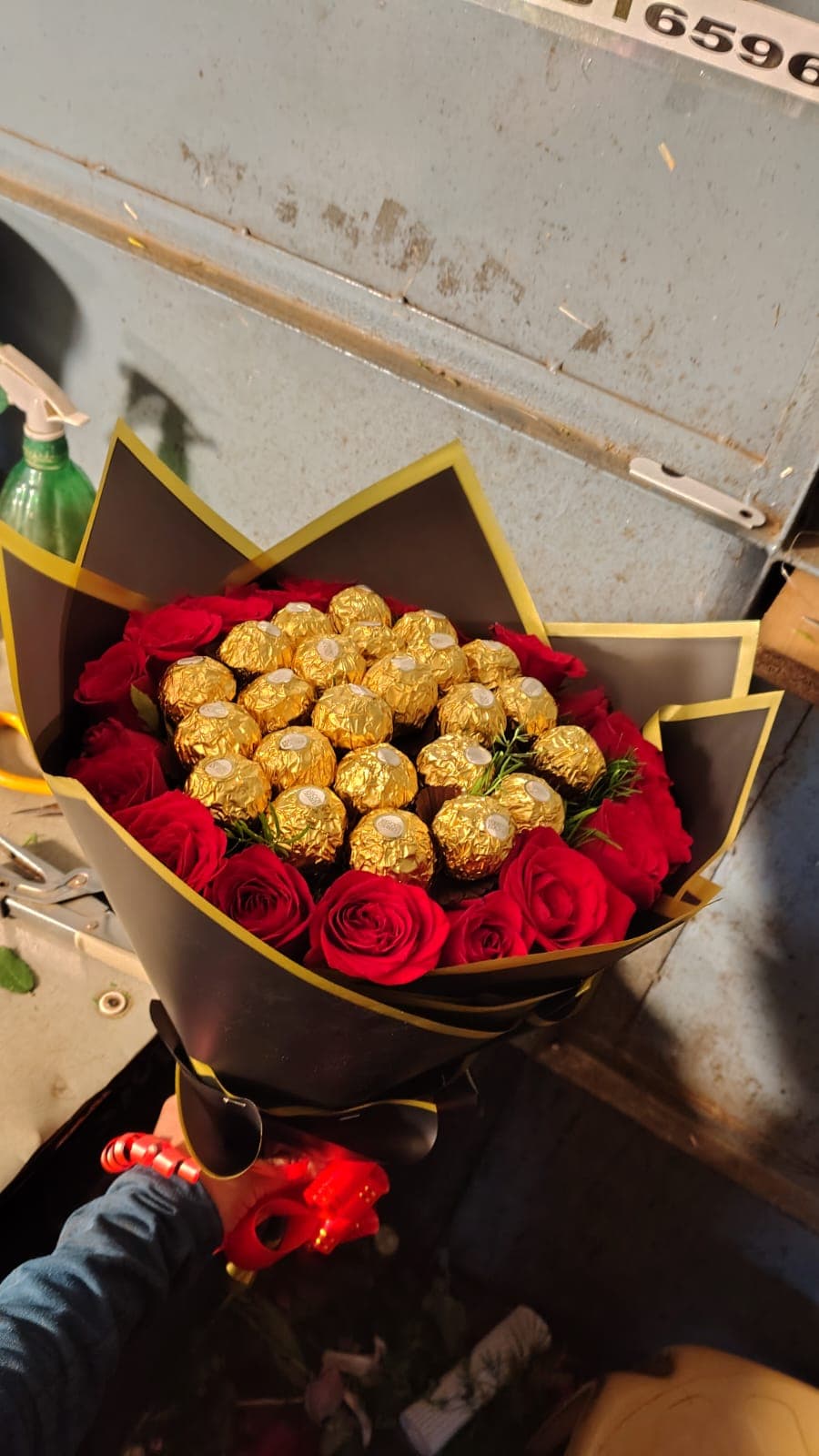 Luxury hand-tied floral bouquet with fresh red roses